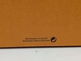 an image of a brown box with a black logo on it