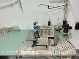 a sewing machine sitting on a table in a room