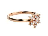 a close up of a diamond ring on a white background