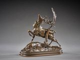 bronze sculpture of a stag and deer on a wooden base