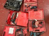 a lot of tools that are sitting on the floor
