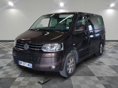 a brown van that is parked in a room