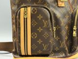 Sac à dos Louis Vuitton en cuir marron et beige