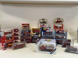 many different types of toy vehicles on display on the table