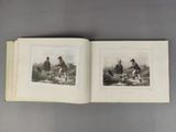 an open book with two pictures of men and dogs on it