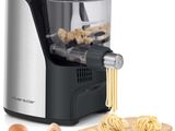 a close up of a pasta maker with pasta being made