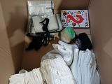 a cardboard box with many items inside of it