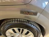 a close up of a car tire with a sticker on it