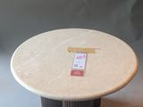 a small table with a sticker on top of it