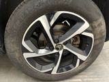 a close up view of a tire on a car