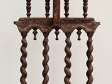 an image of a wooden chair sitting on top of a white table