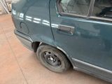 a small car that is parked in a garage