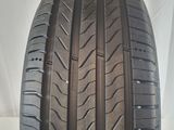 a close up of a tire on a white surface