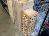 several pieces of wood stacked on top of each other in a store