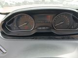 a car dashboard with a speedometer and gauges on it