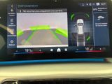 a picture of a car with a gps device on the dashboard