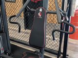 the home gym equipment is in the corner of the room