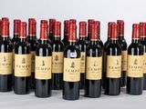 six bouteilles de vin rouge alignées sur une table