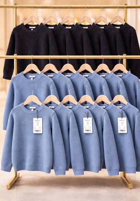 a rack with a lot of shirts on it in a store