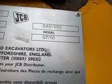 a sign on the side of a machine that says jcb