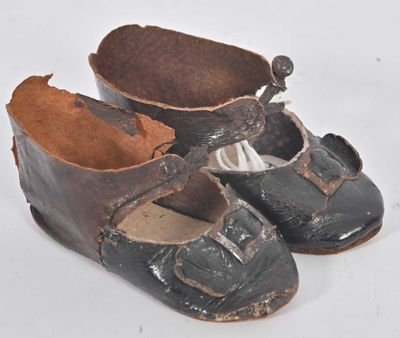 Eden Bébé ? paire de bottines en cuir noir avec applique de …