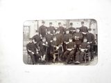 a group of men in uniform posing for a picture
