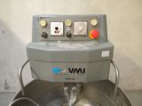 a mixer that is sitting inside of a metal bowl