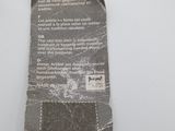 a tag that is attached to a pair of scissors