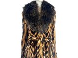an image of a mannequin wearing a brown and black fur coat