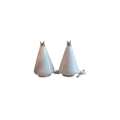 two white lamps that are next to each other