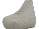 the bean bag chair is made from foam and has a quilted cover