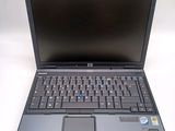 a laptop computer that is sitting on a table