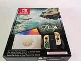 a nintendo wii game system in a box on a table
