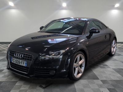 an image of a black audi car in a showroom
