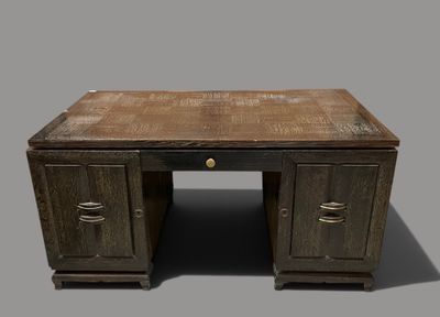 an image of a desk with a wooden top and two drawers