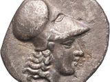 a close up of a coin with a man on it