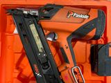 an orange tool box with a stapler, stapler, stapler, and a stapler
