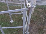 a metal gate that has a bunch of metal bars attached to it