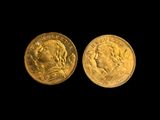 deux souverains d'or, dont l'un représente une tête et l'autre une tête