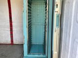 a small open door in the middle of a room