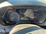 a close up of a car dashboard with a speedometer and gauges