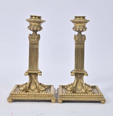 pair of antique brass candlesticks