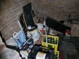 a pile of electronic equipment sitting on the ground