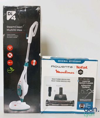 the box of the vacuum cleaner is next to the box of the vacuum