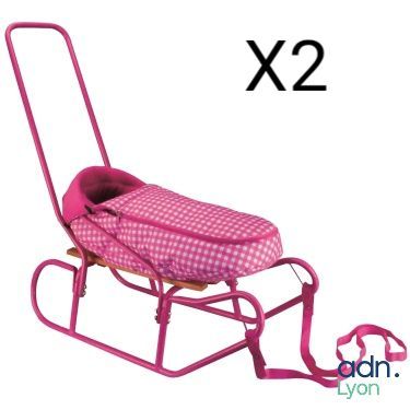 a pink baby stroller with a pink seat on it