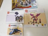 several legos are sitting on a table next to each other