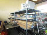 a room with a lot of shelves that have various items on them