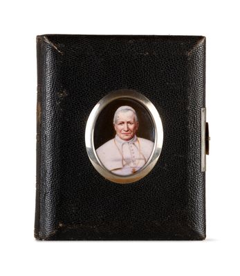 portrait of a man in a white robe in a black leather case