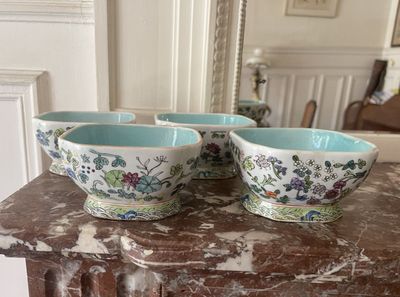 three bowls sitting on top of a marble table