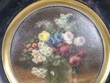 a picture of a painting of flowers in a vase on a table